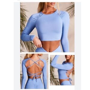 Blue long sleeve ruched shoulder crisscross tie back cropped workout gym top L